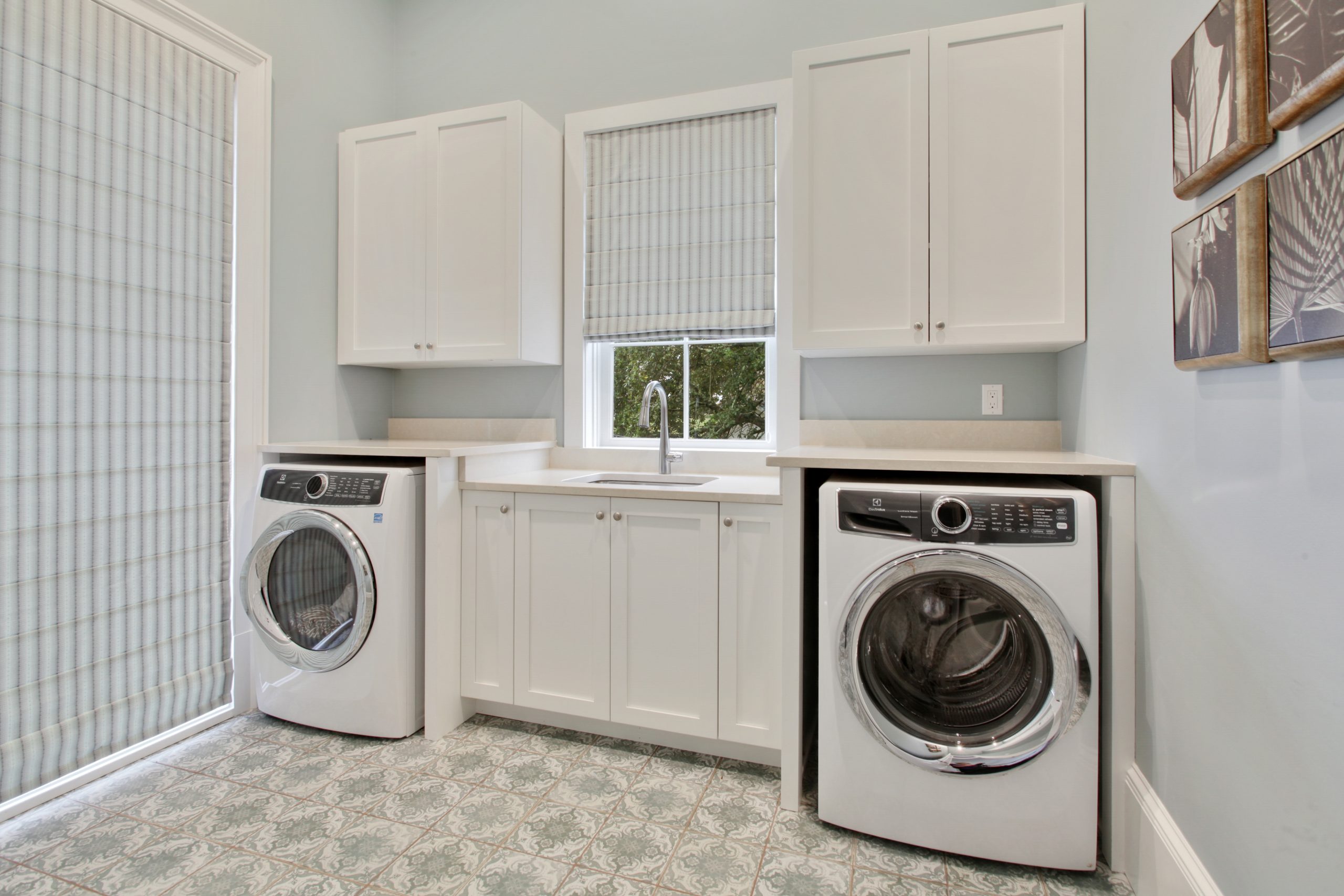 Laundry Room of Audubon House luxury new construction custom home designed and built by DMG