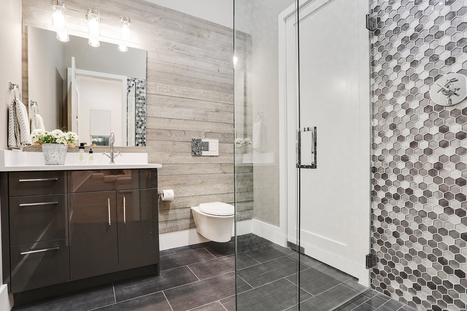 Luxury Bathroom in Elmeer House new construction custom home designed and built by DMG Design+Build