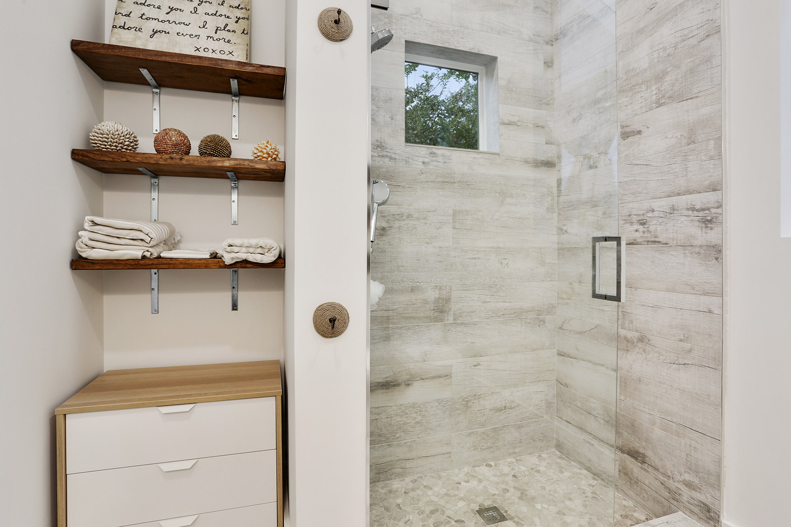 Bathroom of Elmeer House luxury new construction custom home designed and built by DMG Design+Build