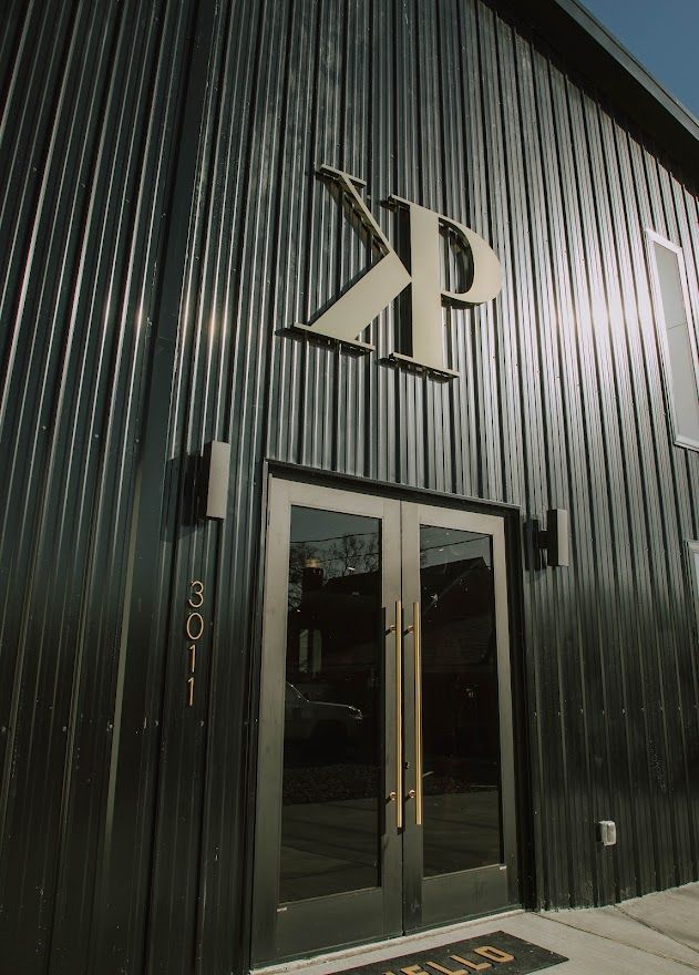 Salon KP entrance designed and built by DMG's commercial construction division